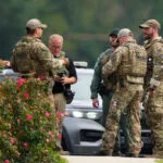 Louisiana police searching for 2 escaped prisoners after 4 slipped through fence